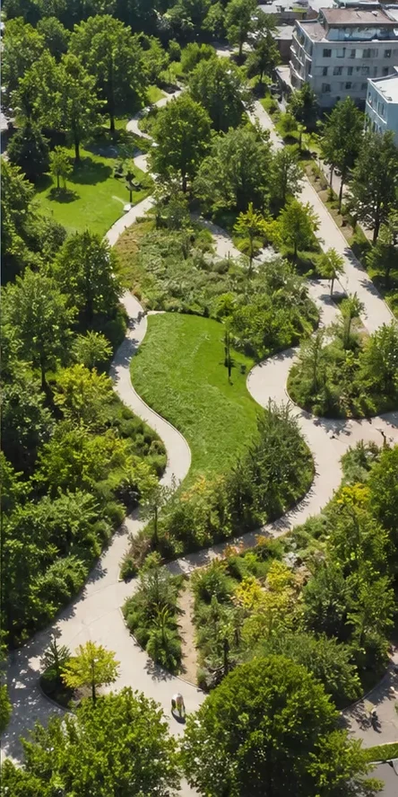 Luchtbeeld van een park met paden, bomen en plantvakken